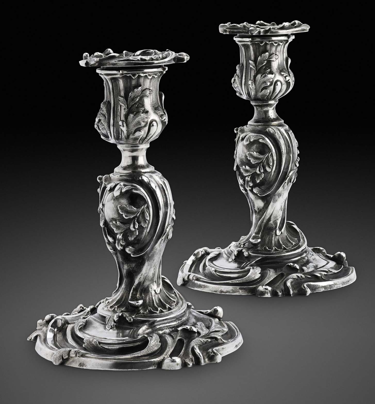 A pair of Fabergé silver candlesticks