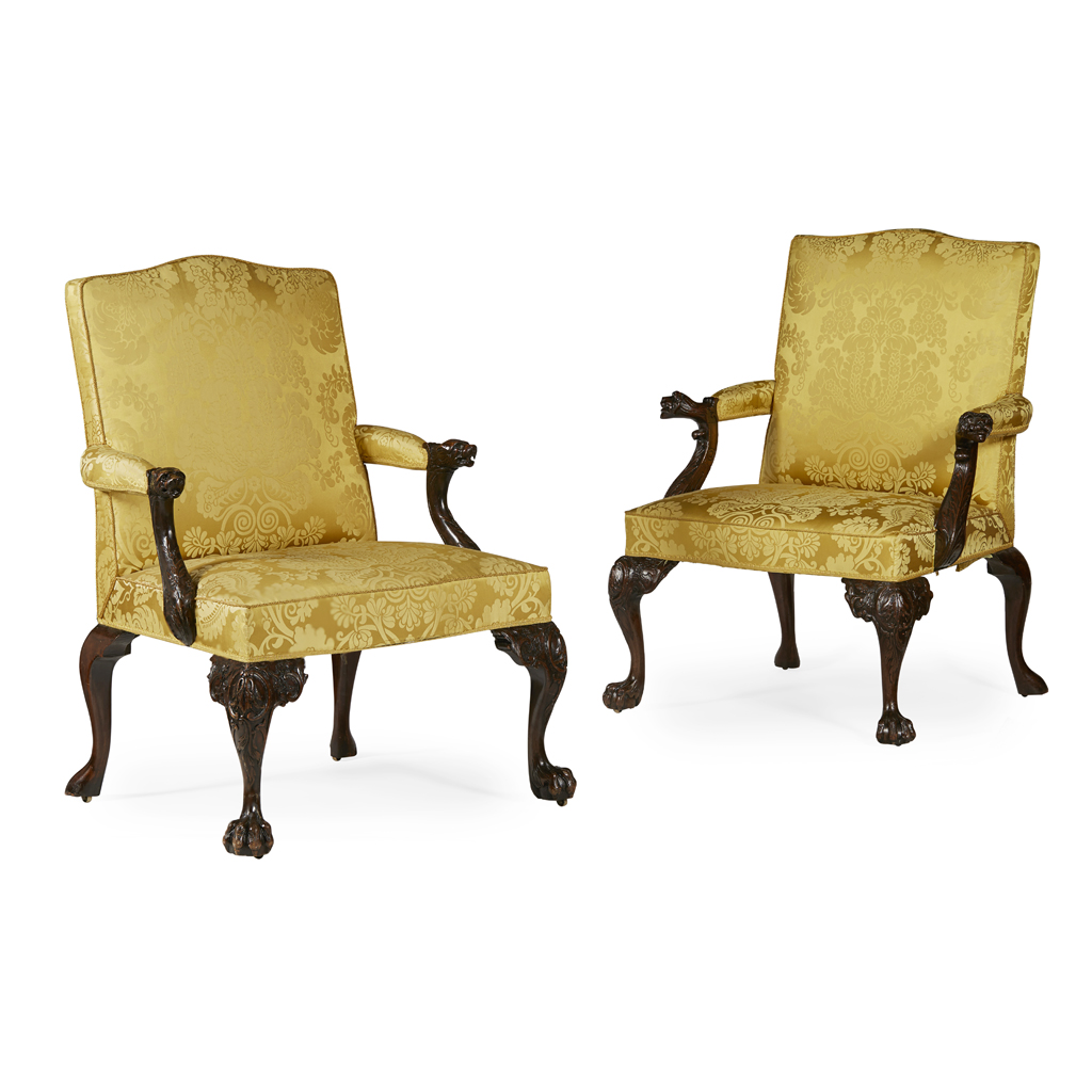 MATCHED PAIR OF GEORGE II STYLE MAHOGANY LIBRARY ARMCHAIRS