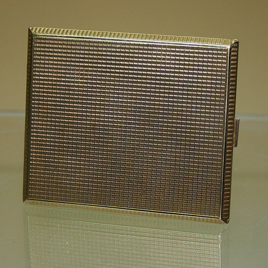 A 9ct gold cigarette case