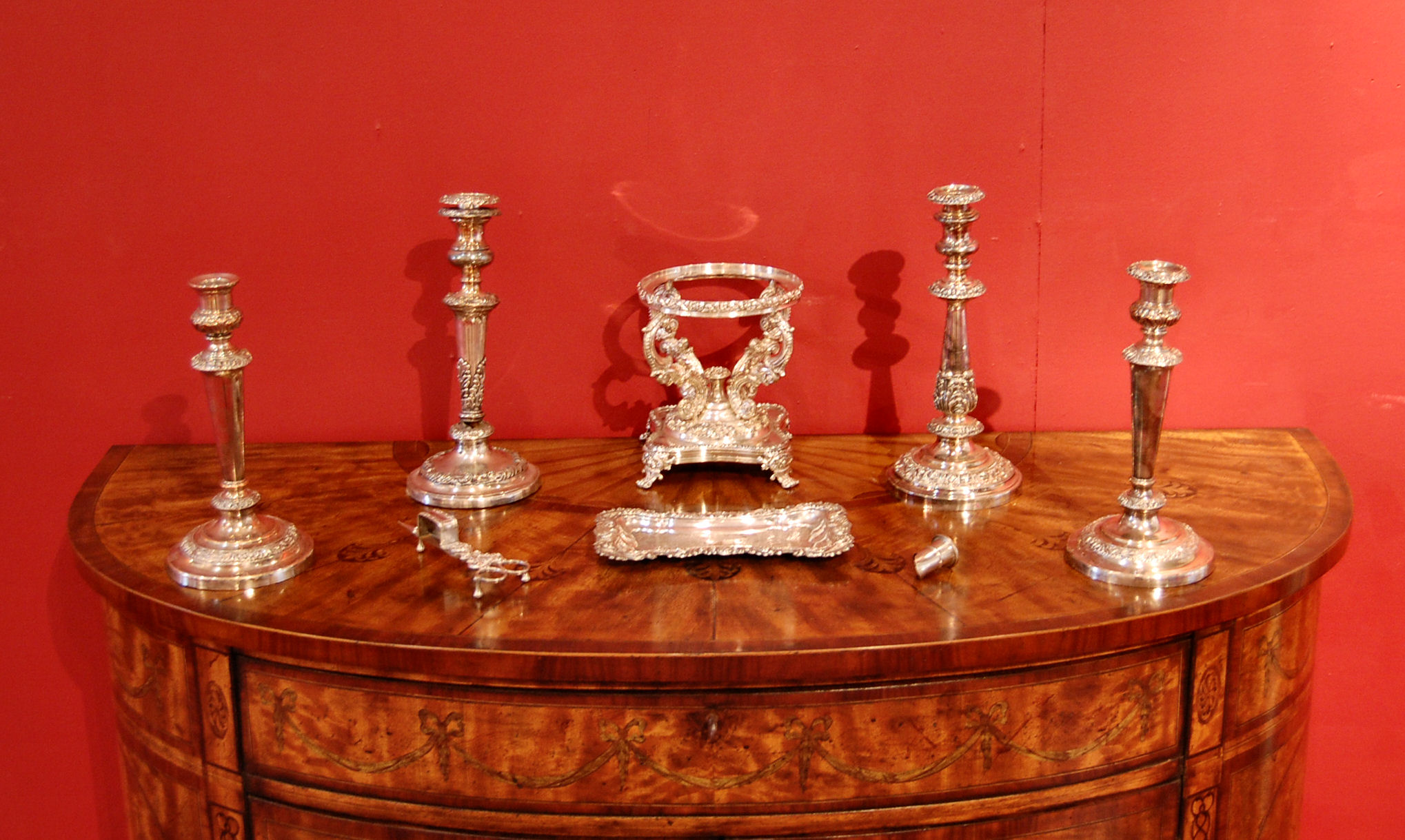 A pair of late 19th century silver plate candlesticks