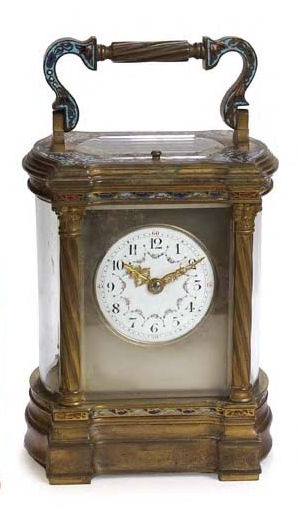 A French brass cased and enamel carriage clock,