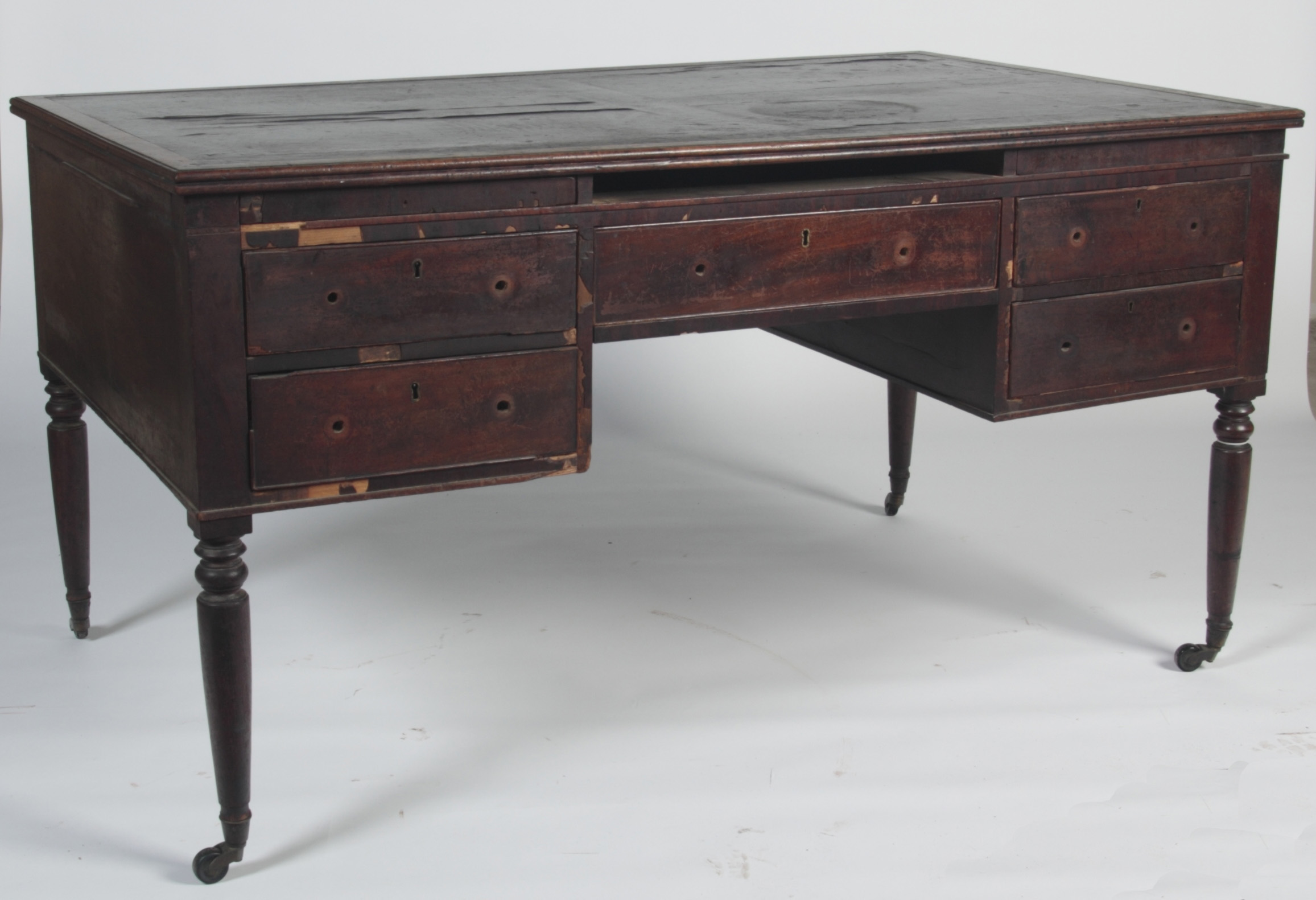 A 19th century mahogany partners' desk