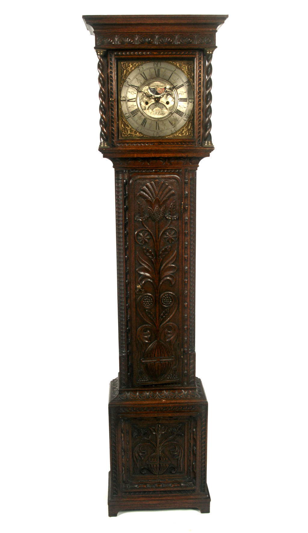 A 19th century heavily carved oak longcase clock By Thomas Lister