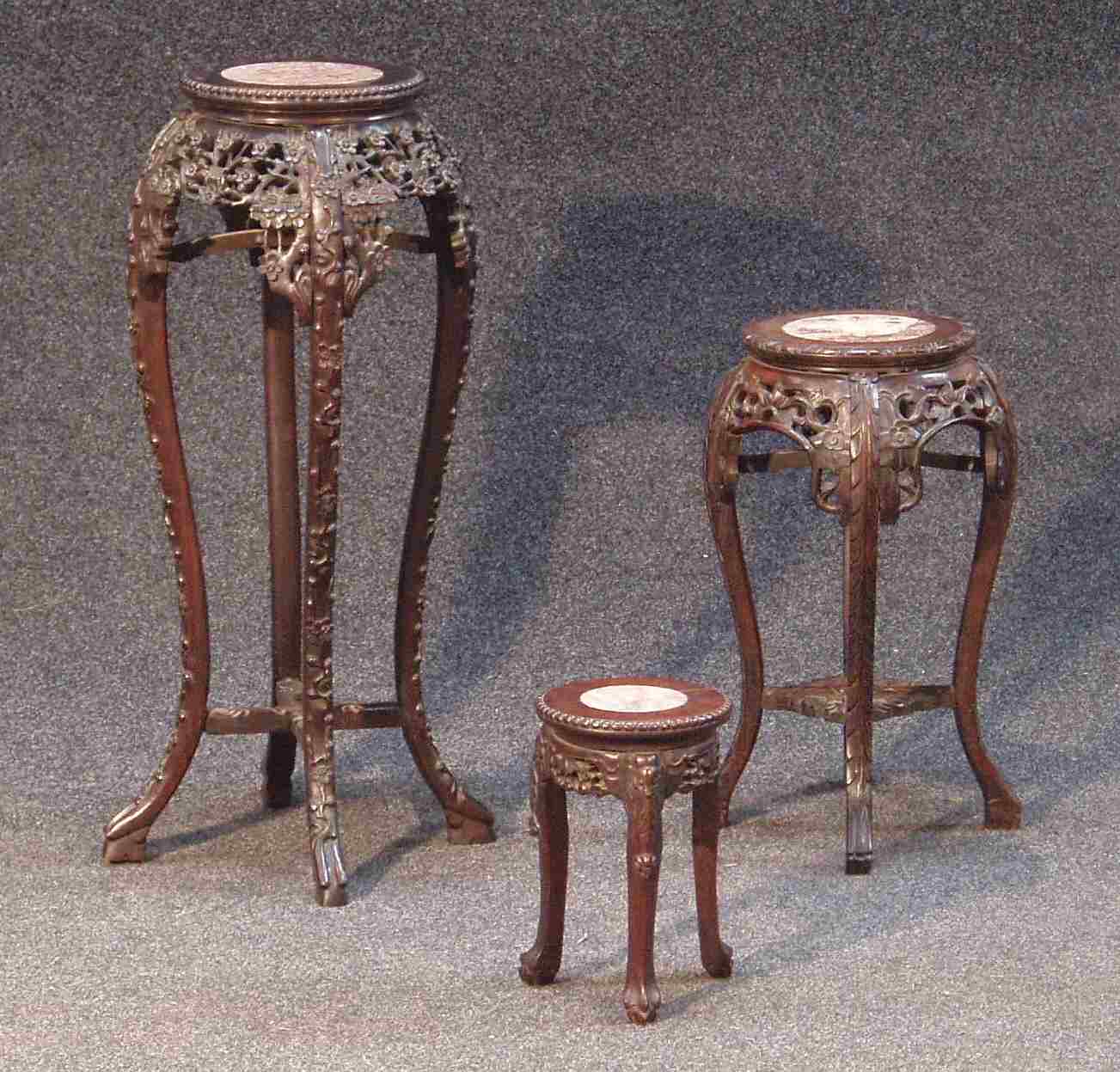 A rosewood jardiniere stand,
