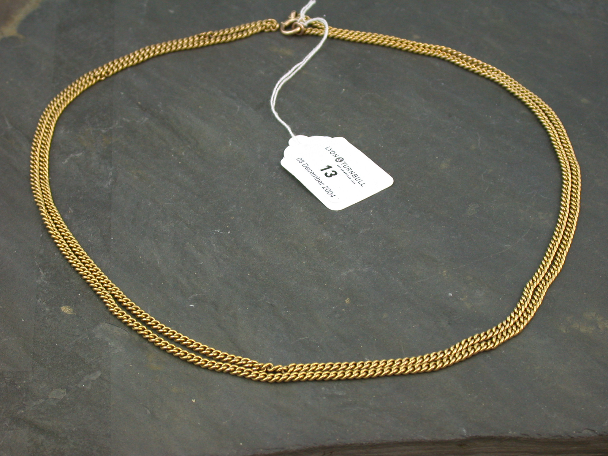 A good quality long 15ct gold chain