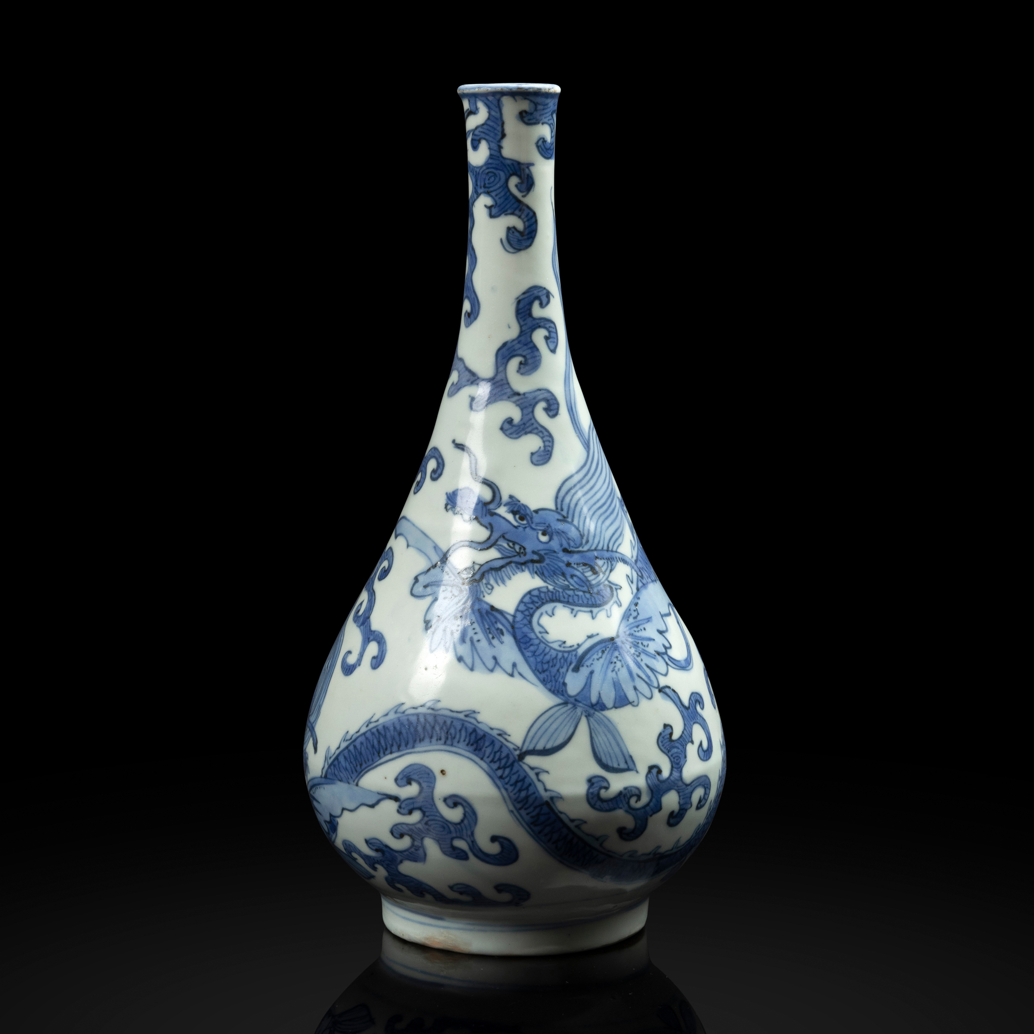 CHINESE BLUE AND WHITE 'WINGED DRAGON' BOTTLE VASE