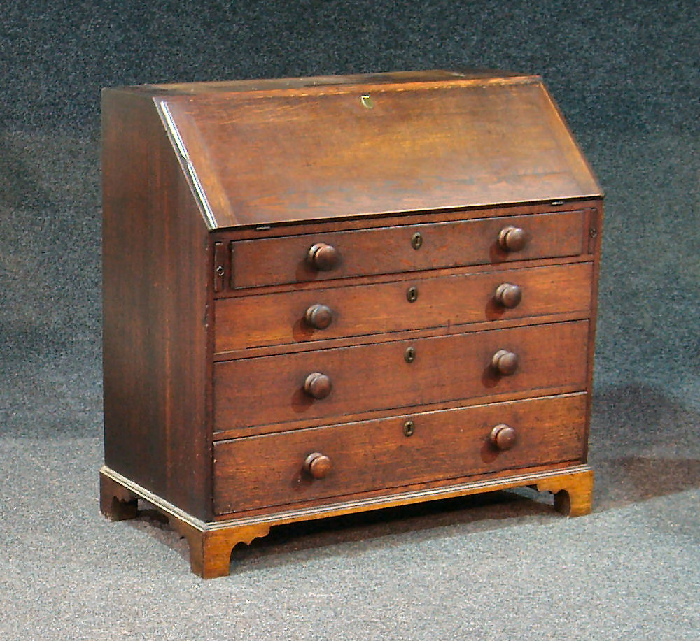 A George III oak bureau