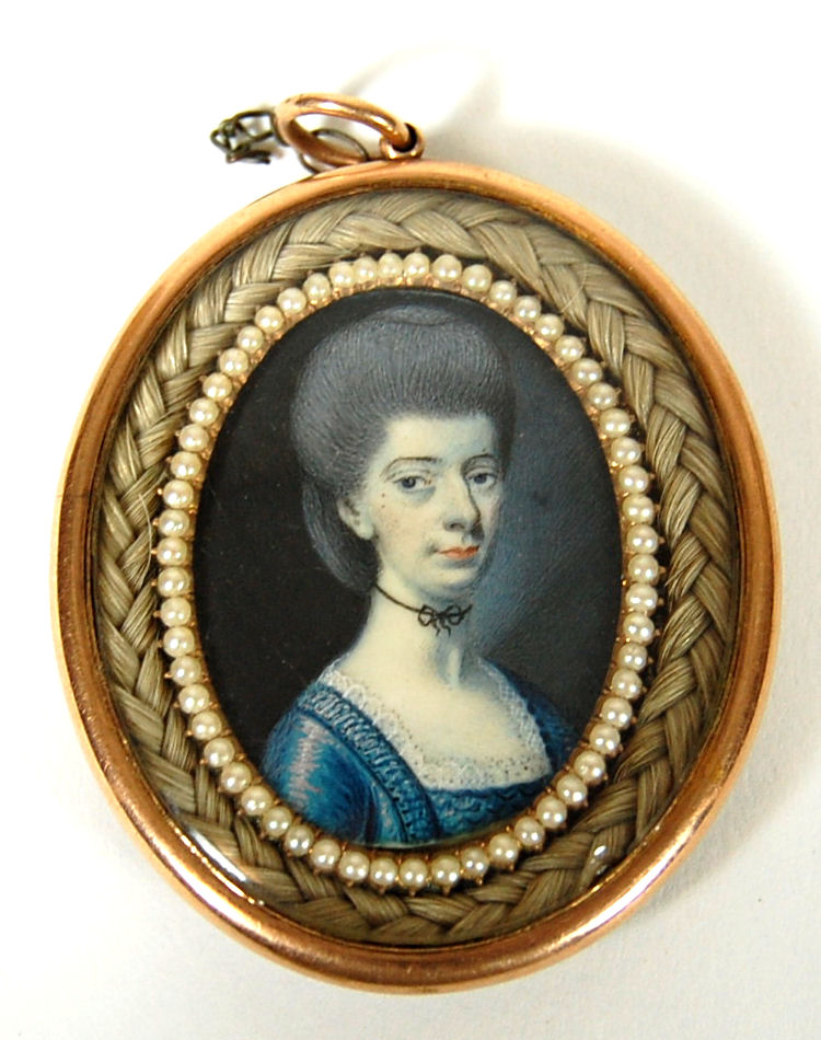 A late 18th century oval portrait miniature of a lady