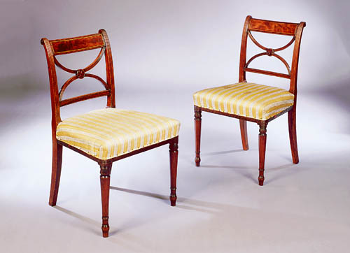 A pair of Regency mahogany dining chairs