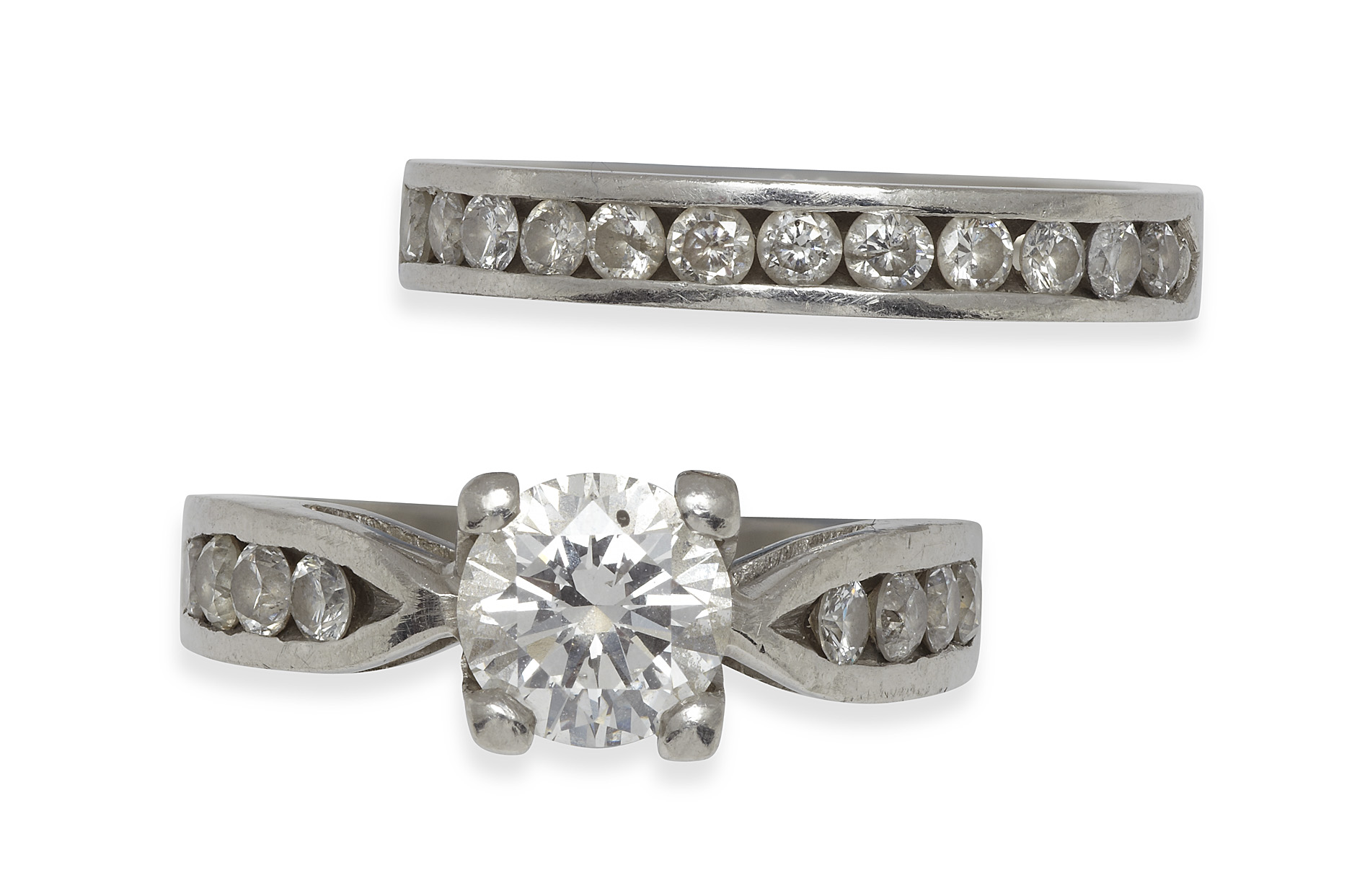 A platinum mounted diamond single-stone ring