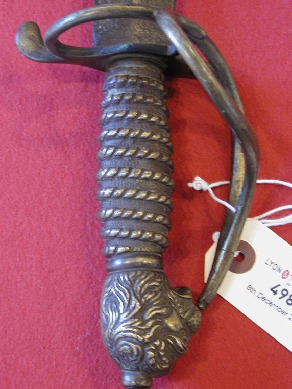 A 19th century continental brass hilted short sword
