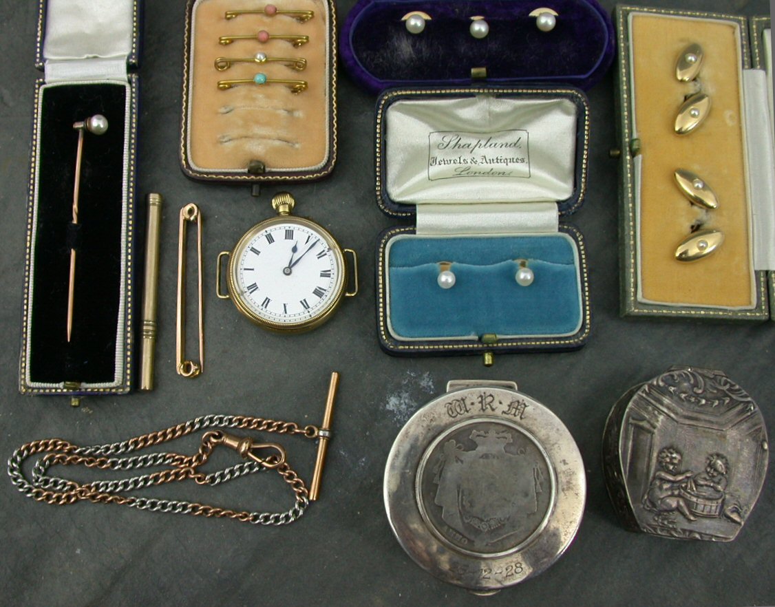 A pair of pearl set cufflinks,