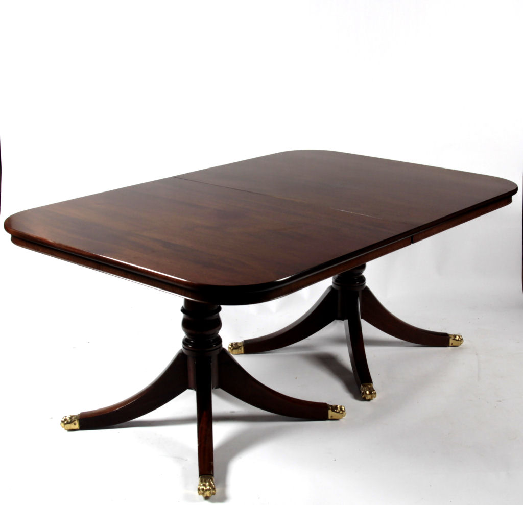 A Regency style mahogany dining table