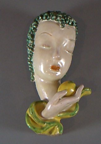 A Goldscheider terracotta wall mask