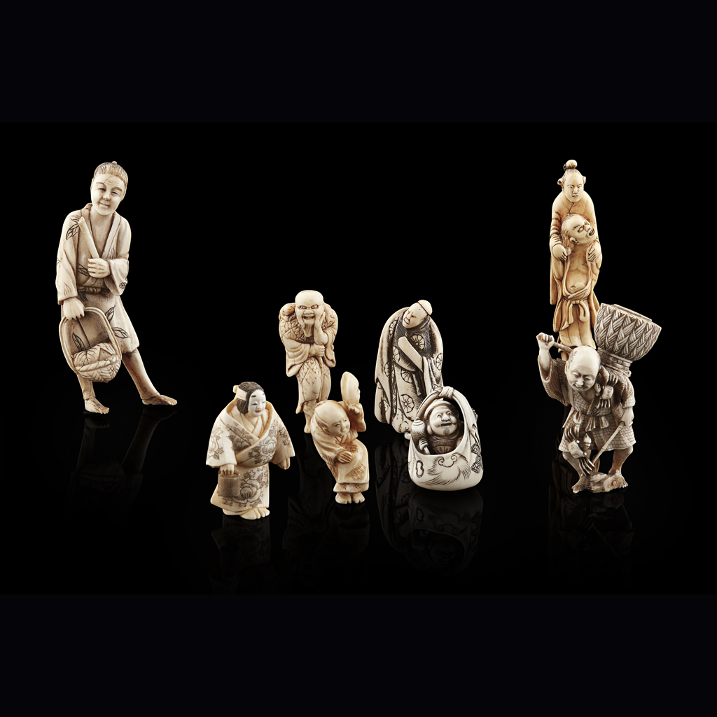 GROUP OF EIGHT IVORY NETSUKE AND OKIMONO