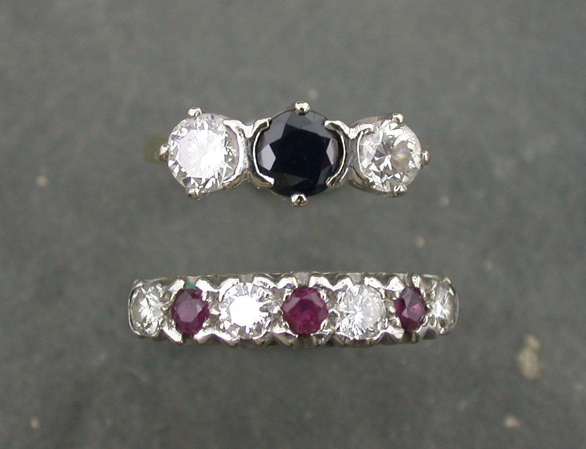 An 18ct gold mounted ruby and diamond half-eternity ring,