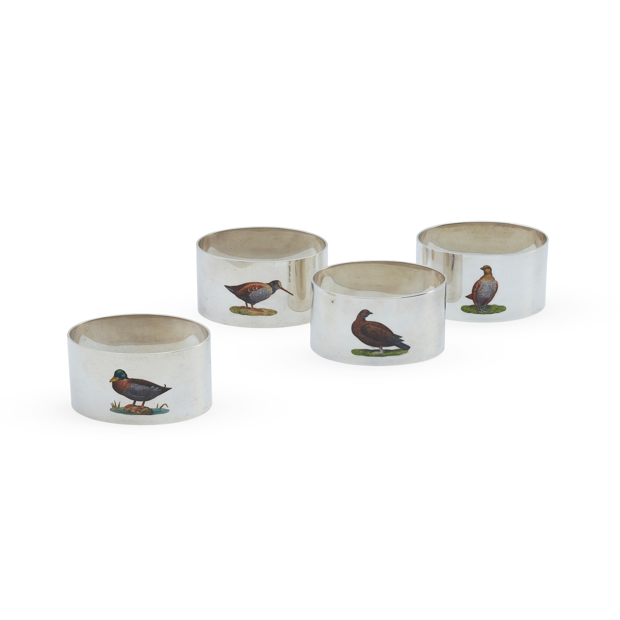 A CASED SET OF FOUR 1920s NAPKIN RINGS