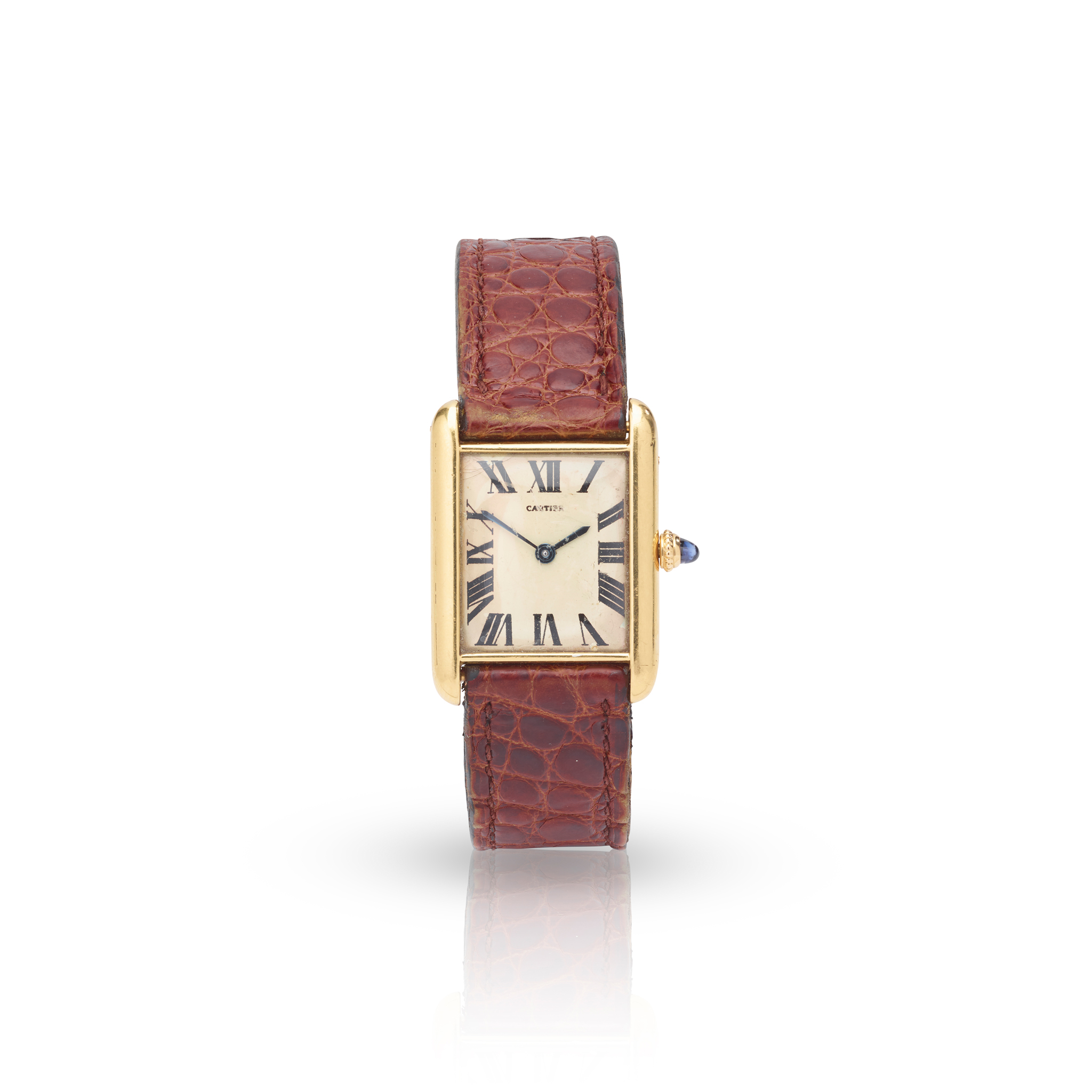 Cartier: A rectangular gold wristwatch