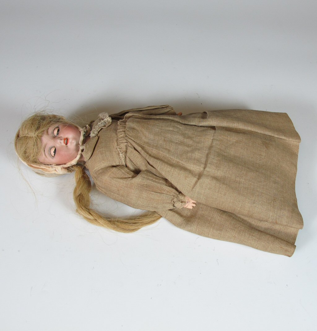 An Armande Marseille bisque head and shoulders doll