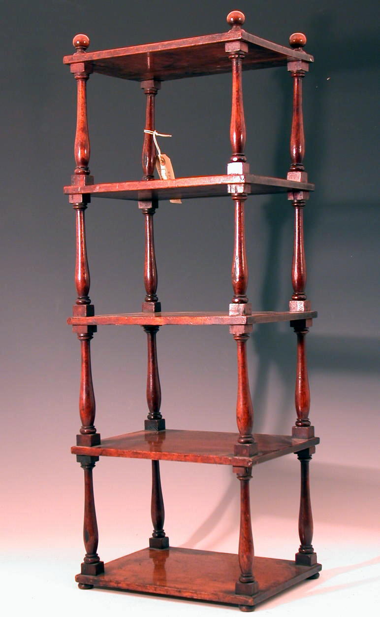A 19th century miniature mahogany etagere