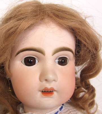 Past auction: BISQUE HEADED LONG FACE JUMEAU DOLL 18 February 2012