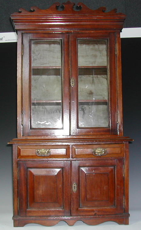 An Edwardian mahogany apprentice bookcase