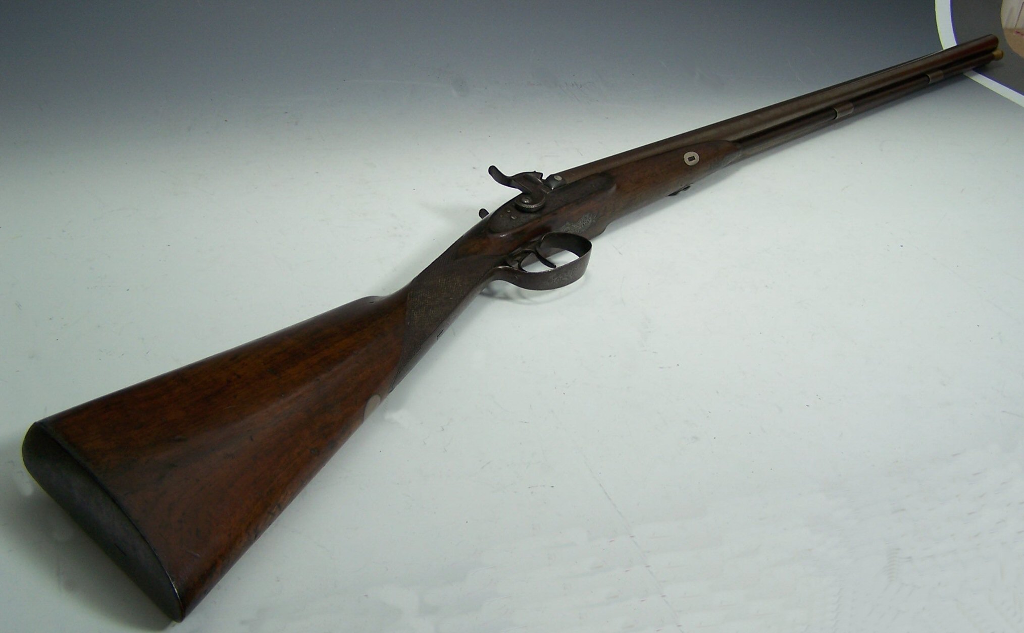 A 19th century double barrel percussion sporting gun