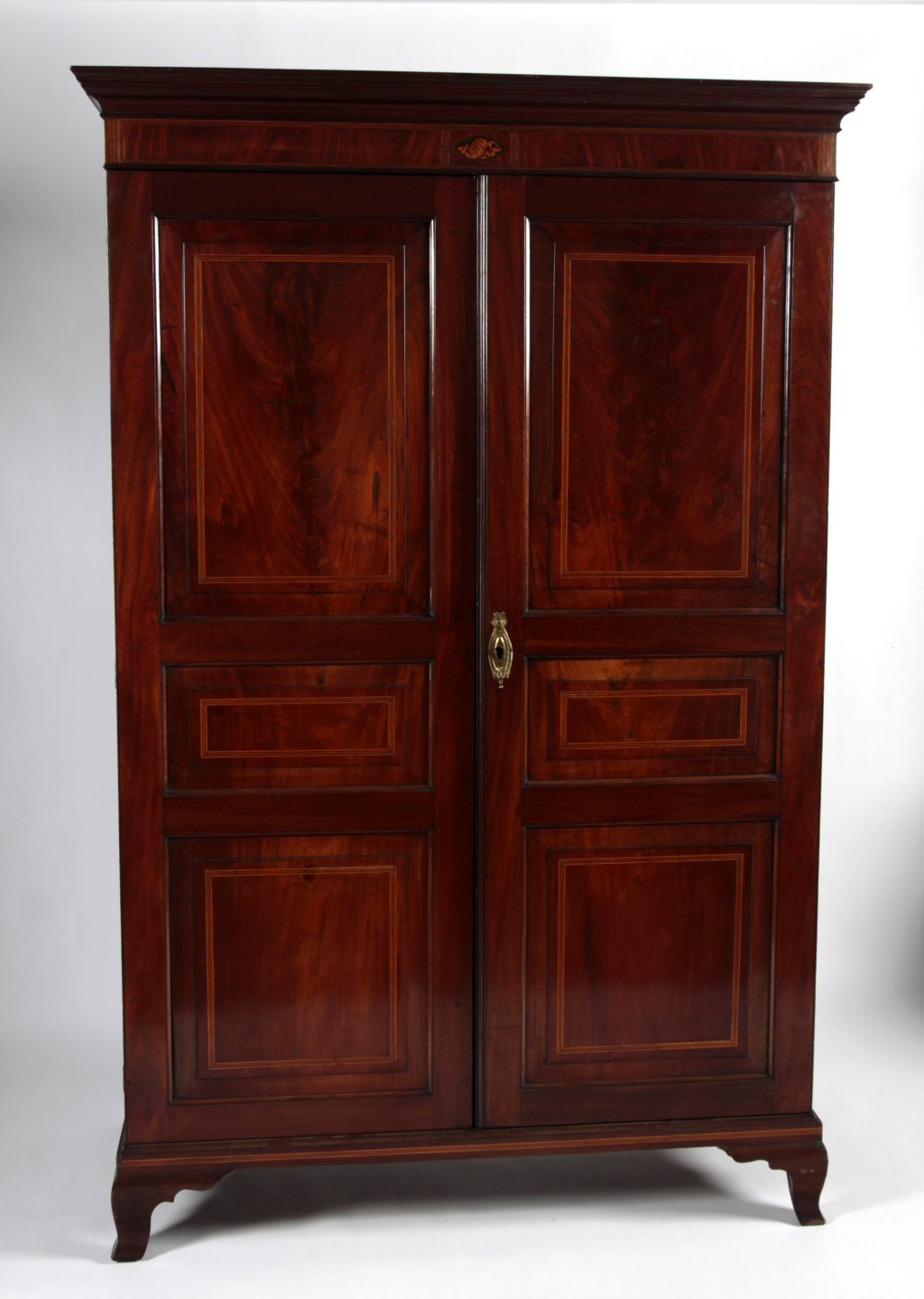 An Edwardian mahogany and inlaid two door wardrobe