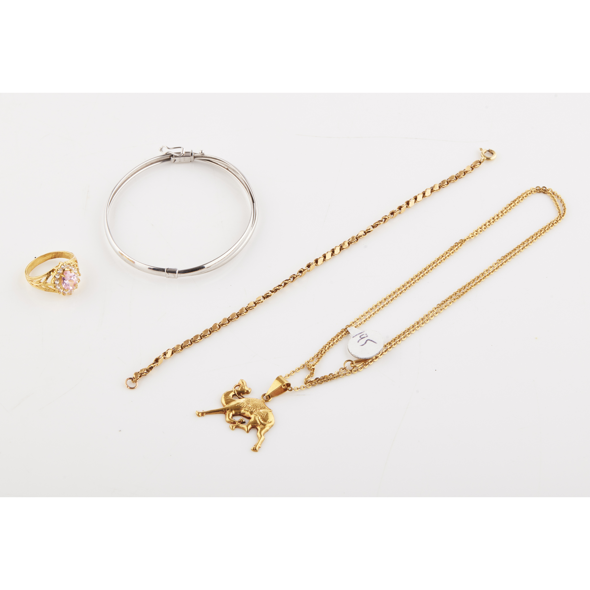 A 9ct white gold hinged bangle