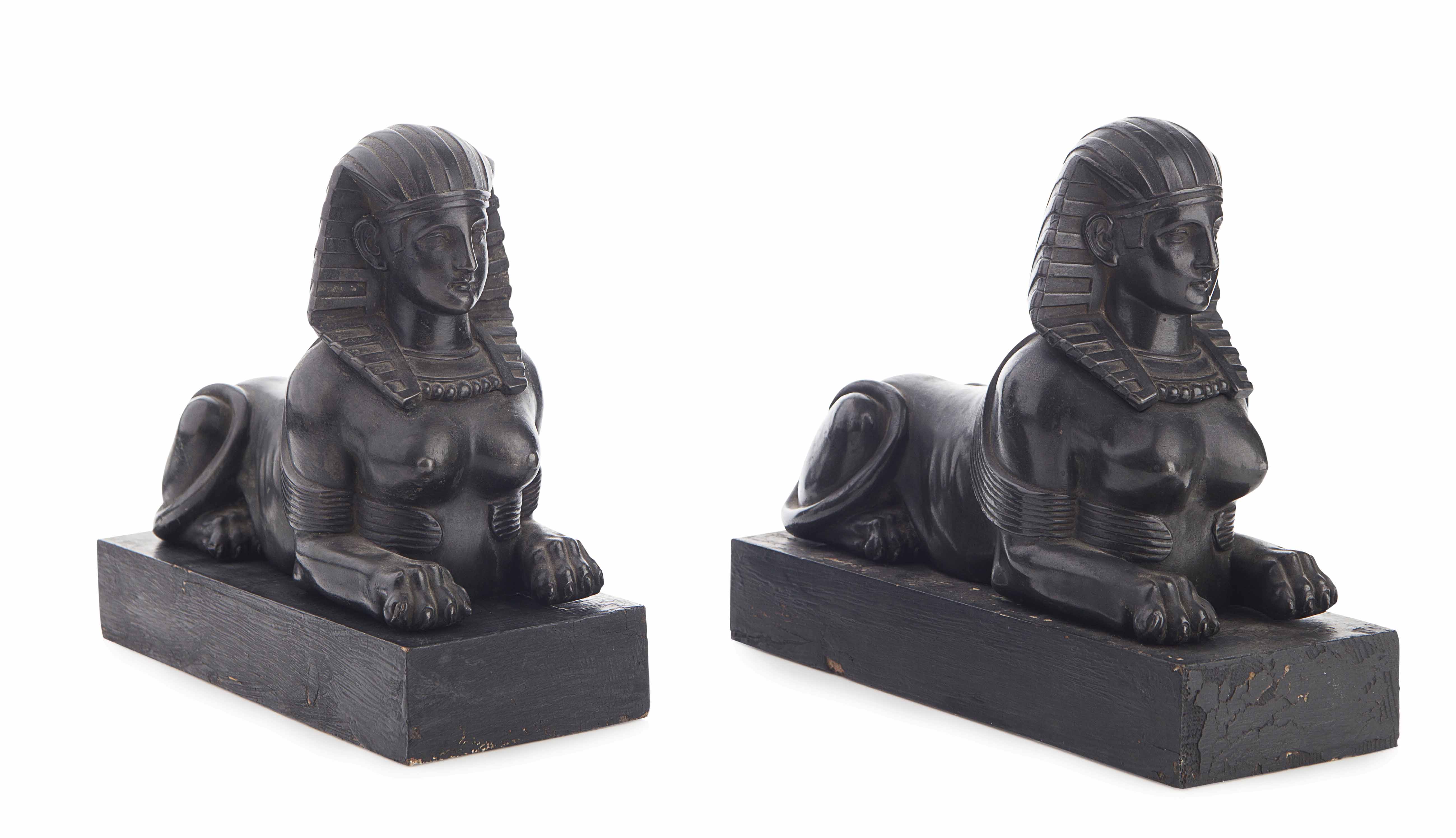 PAIR OF PATINATED METAL FIGURES OF SPHINXES