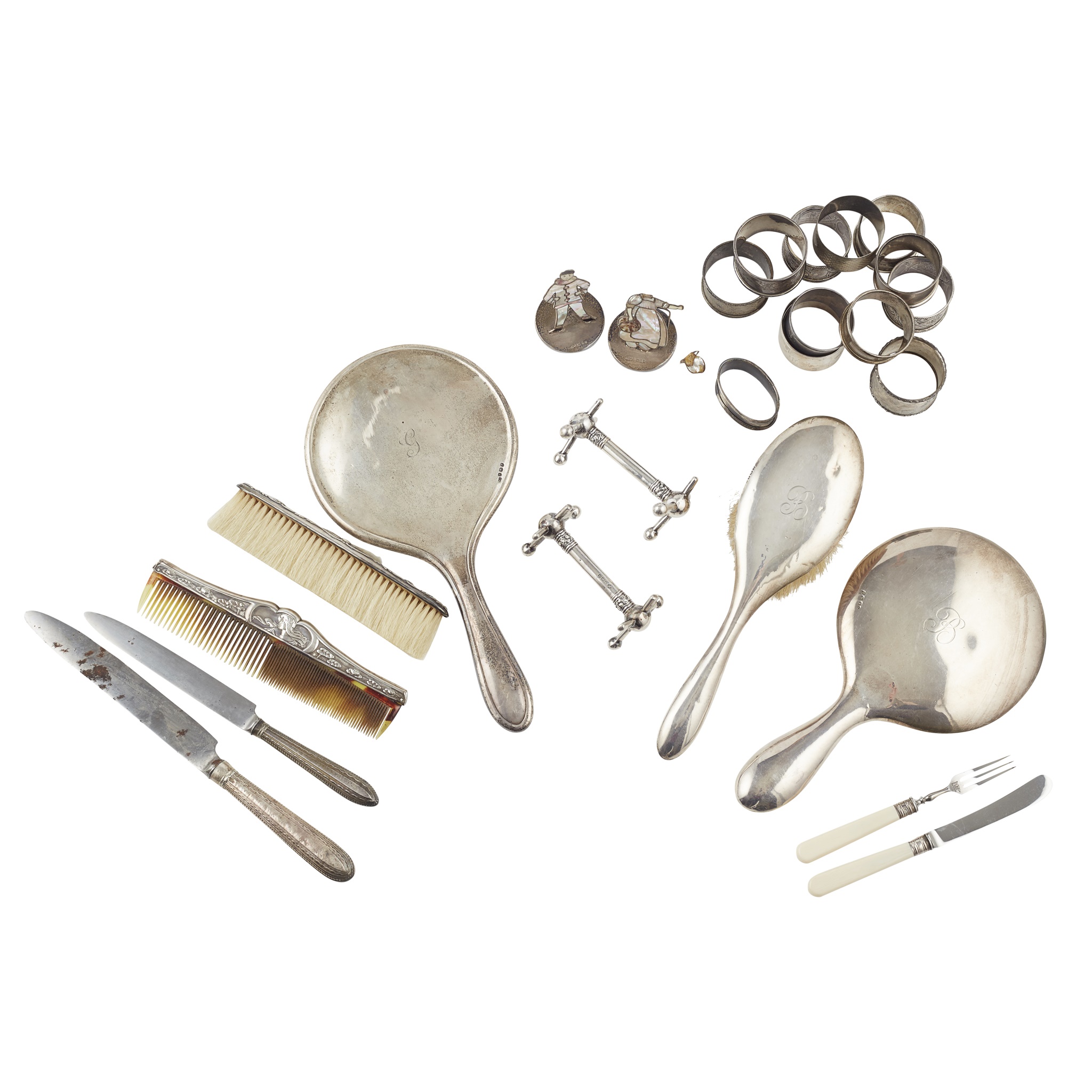 A collection of dressing table brushes and miscellaneous silver