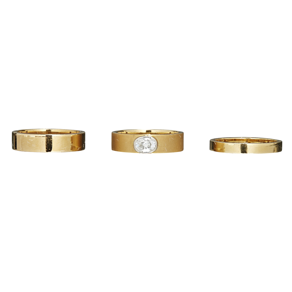A contemporary 18ct gold and diamond ring set