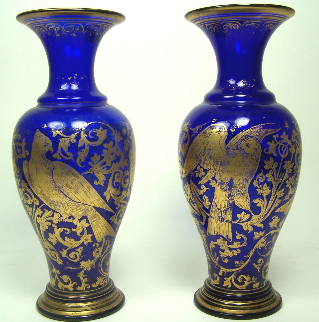 A pair of late 19th century blue glass baluster vases