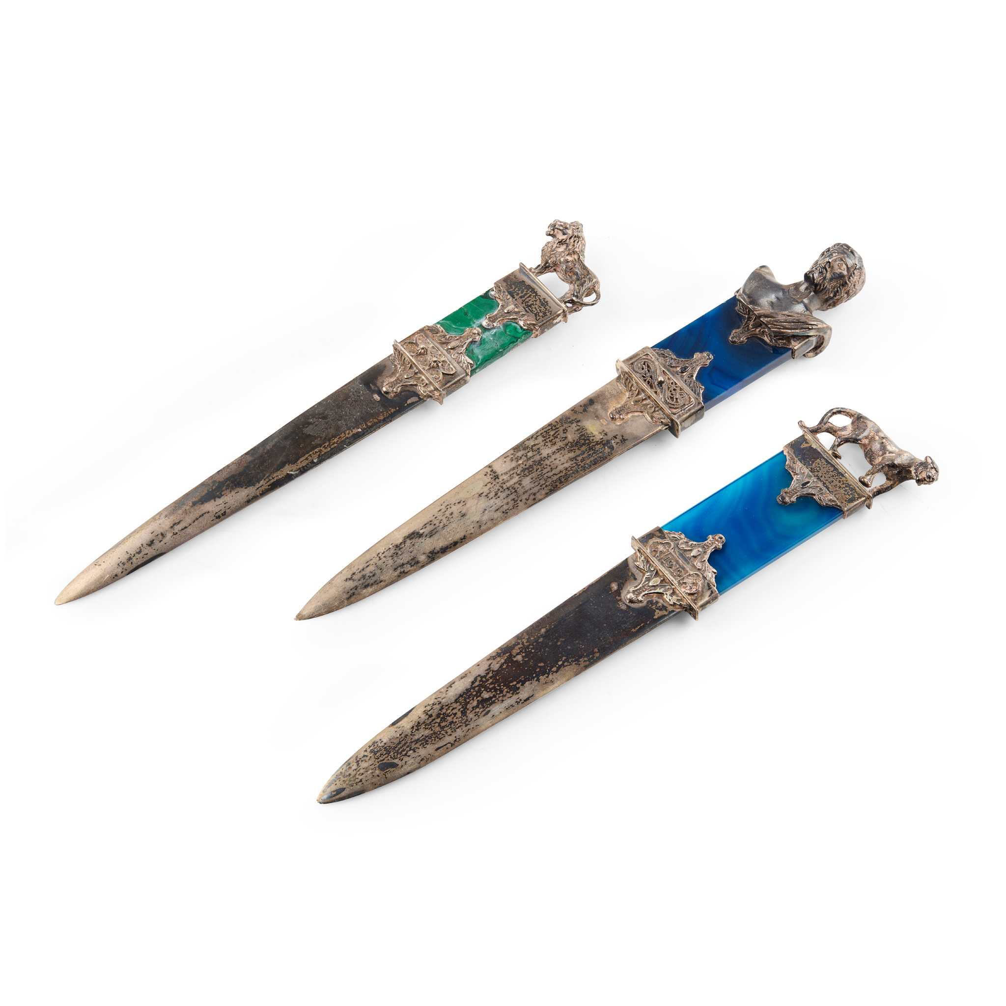 A MATCHED SET OF THREE GRADUATED HARDSTONE AND SILVER LETTER OPENERS