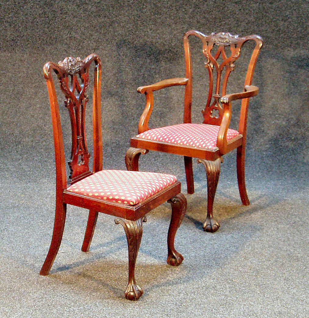 A set of eight 18th century Chippendale style dining chairs