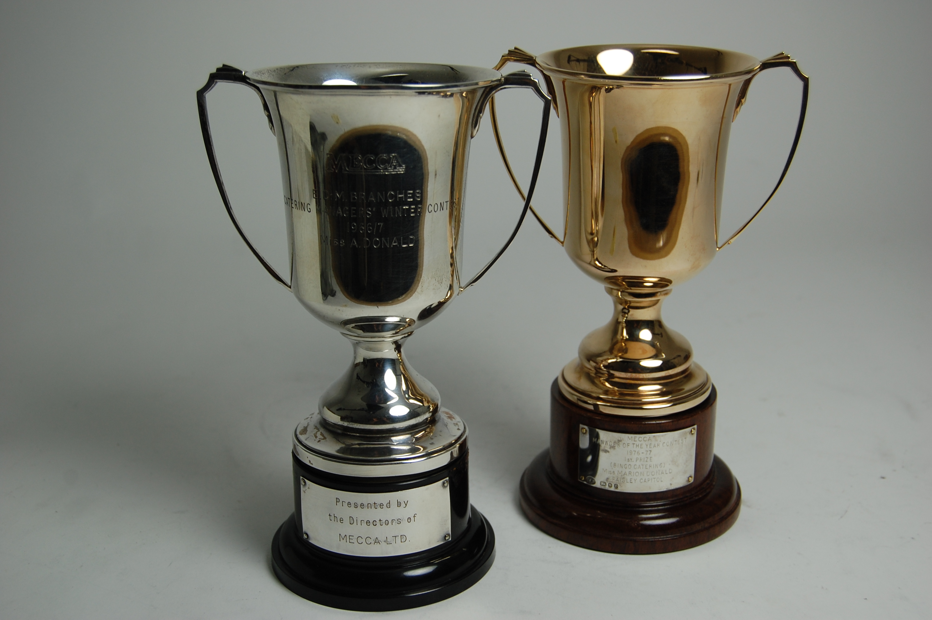 A modern 9ct gold twin handled cup