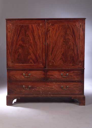 A George III mahogany dwarf linen press