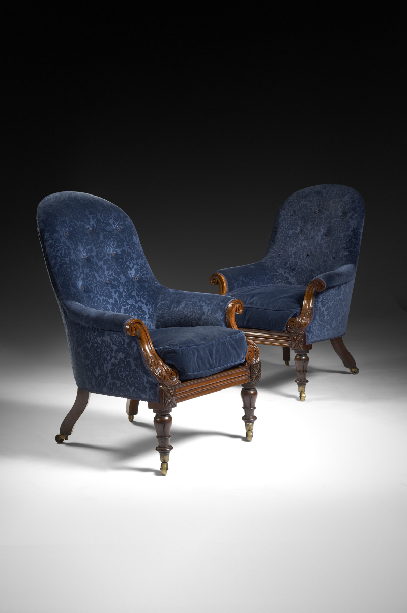 A pair of William IV period rosewood and upholstered tub chairs