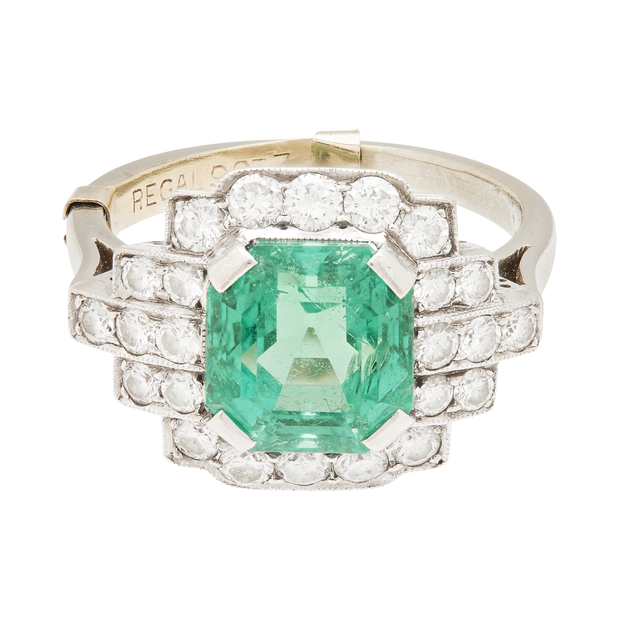 An Art Deco emerald and diamond set ring