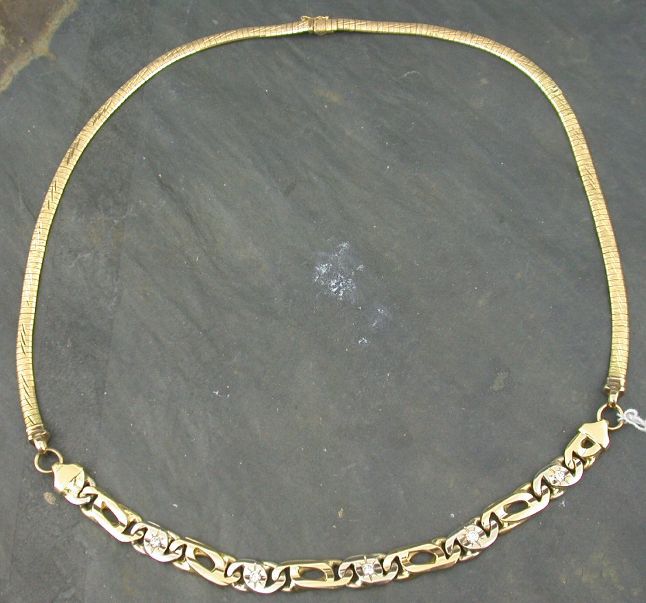 An 18ct gold diamond set fancy link necklace,