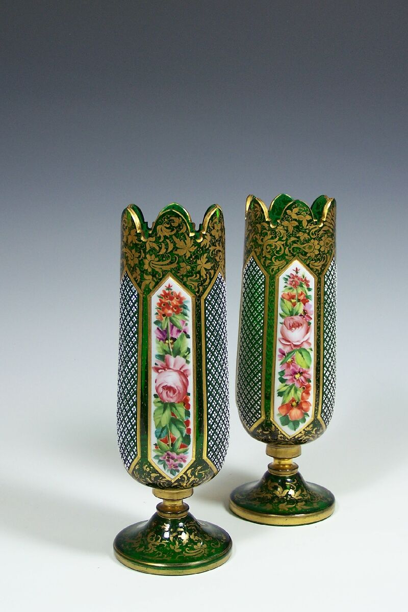 A pair of green Bohemian cut glass vases