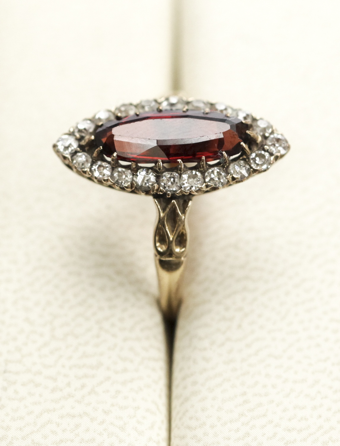 A late Victorian garnet and diamond set cluster ring