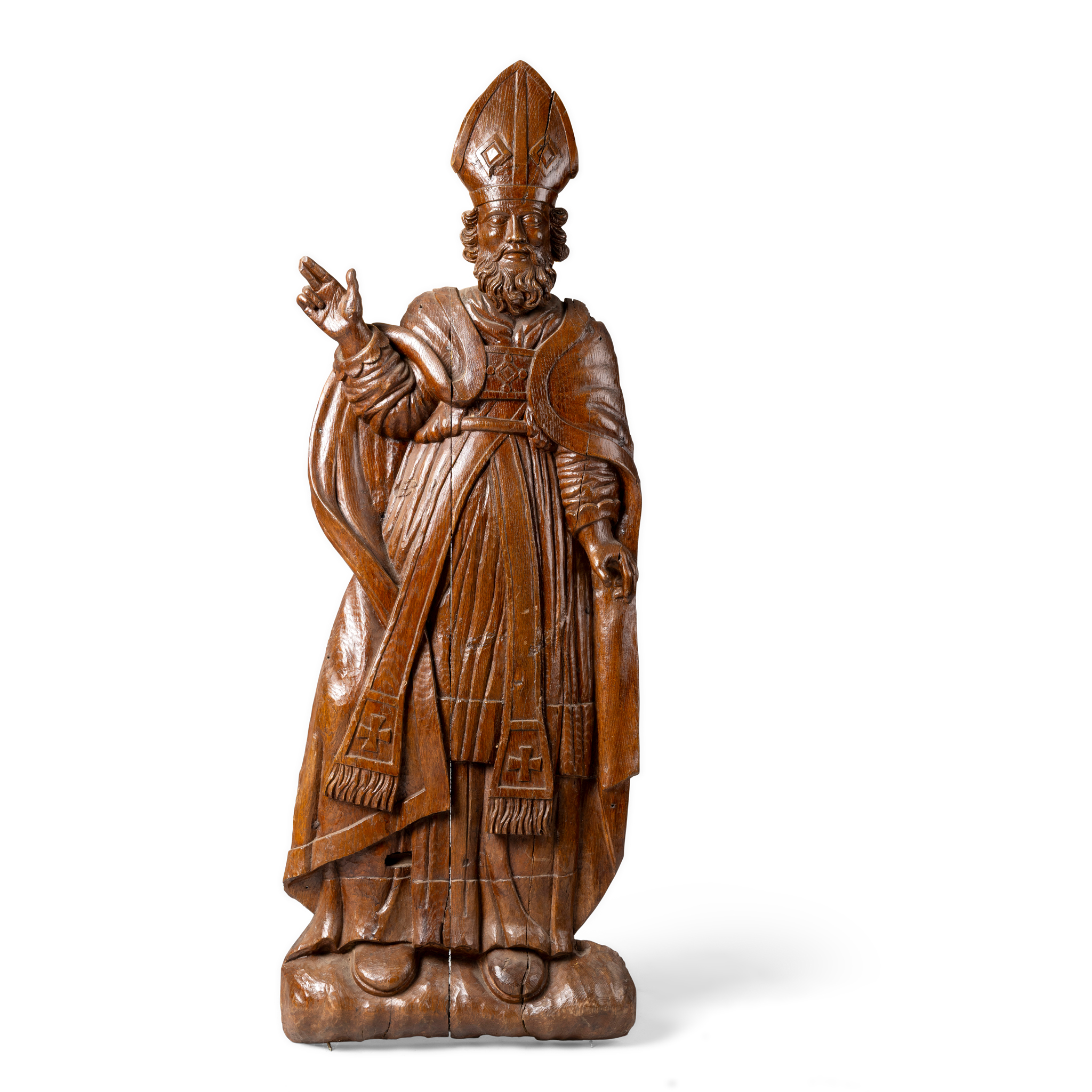 A CARVED OAK FIGURE OF A BISHOP SAINT