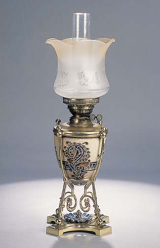 A Doulton Lambeth brass mounted oil lamp