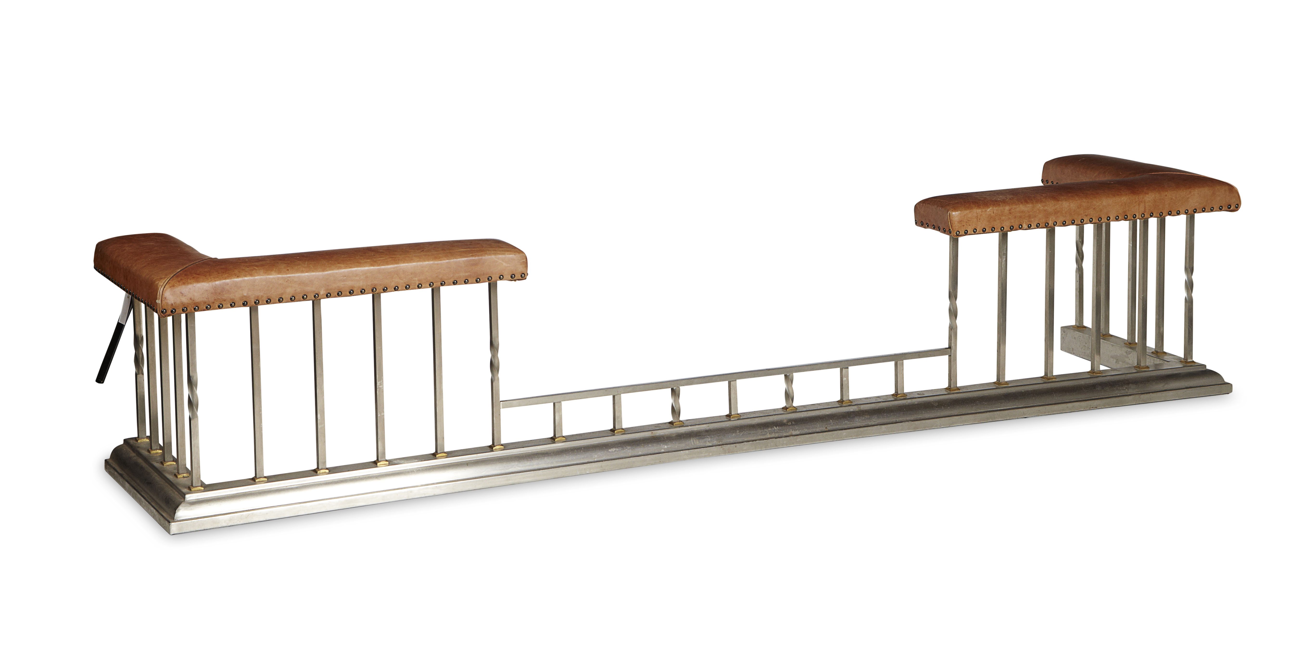 LARGE STEEL, BRASS AND LEATHER UPHOLSTERED CLUB FENDER