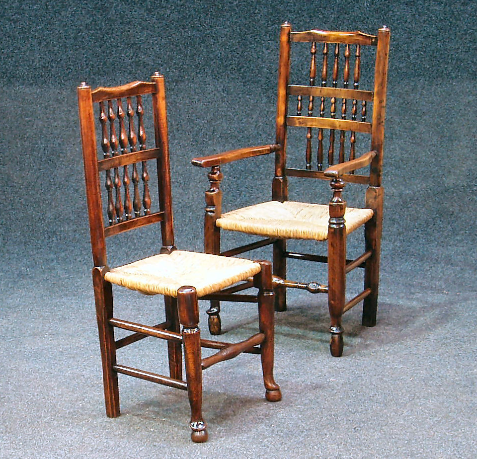 A set of eight oak Lancashire chairs