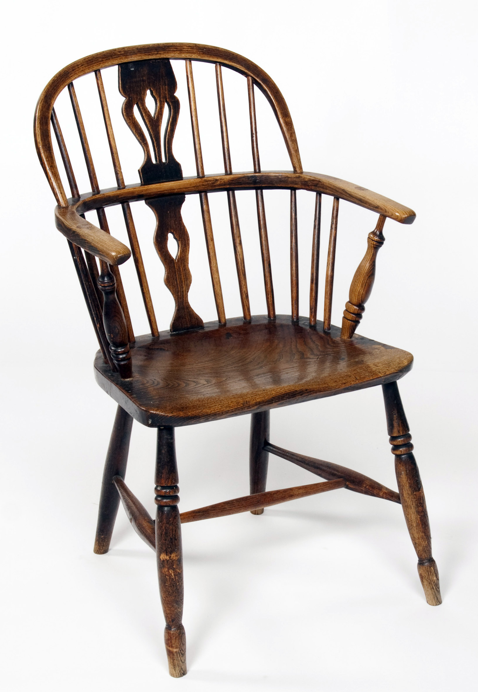 A mid 19th century yew wood and elm Windsor chair Possibly by Thomas Simpson of Boston