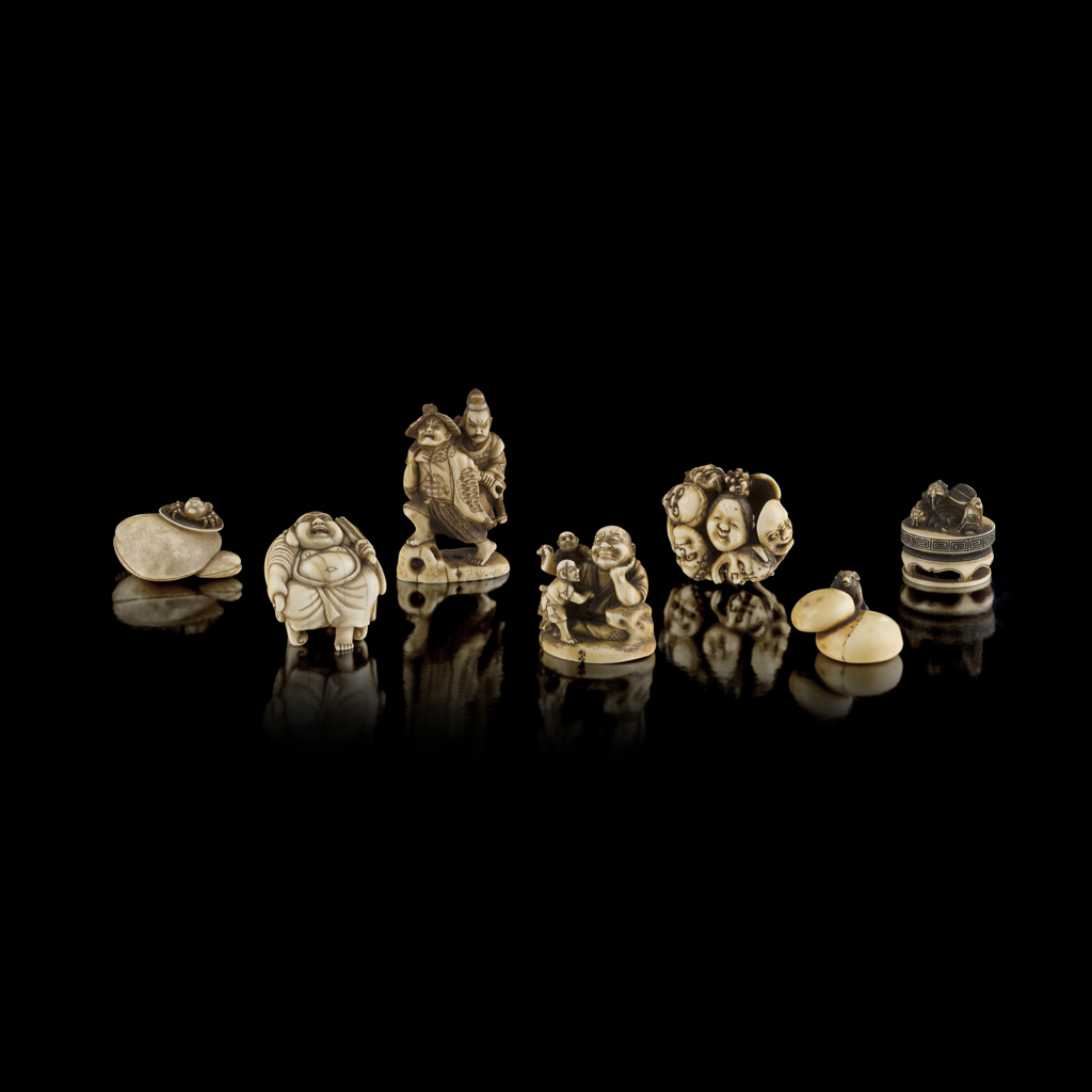 GROUP OF SEVEN CARVED IVORY NETSUKE