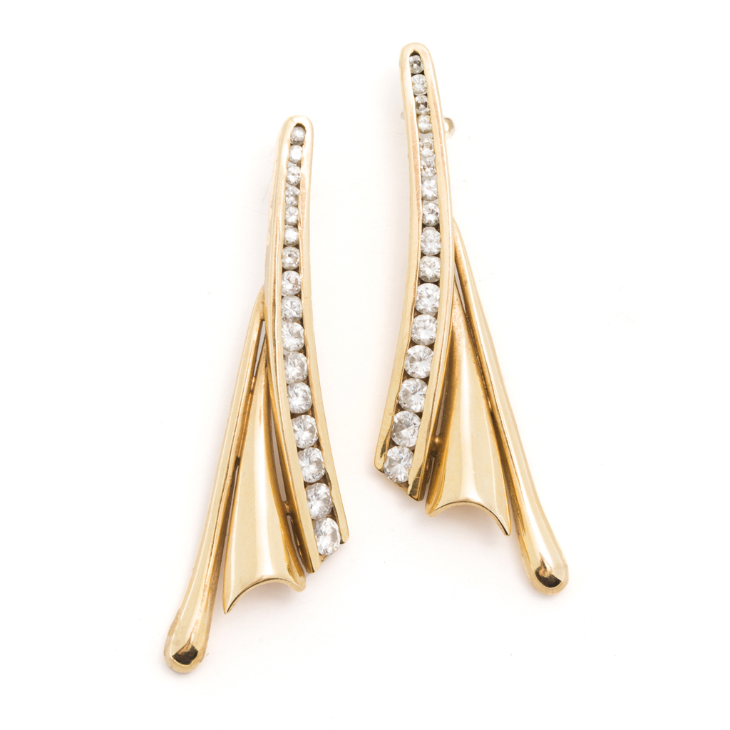 A pair of diamond set pendant earrings