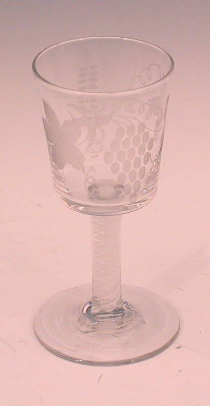 An Edwardian wine glass,